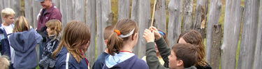 Students clear their mock musket barrels at Fort Necesstiy